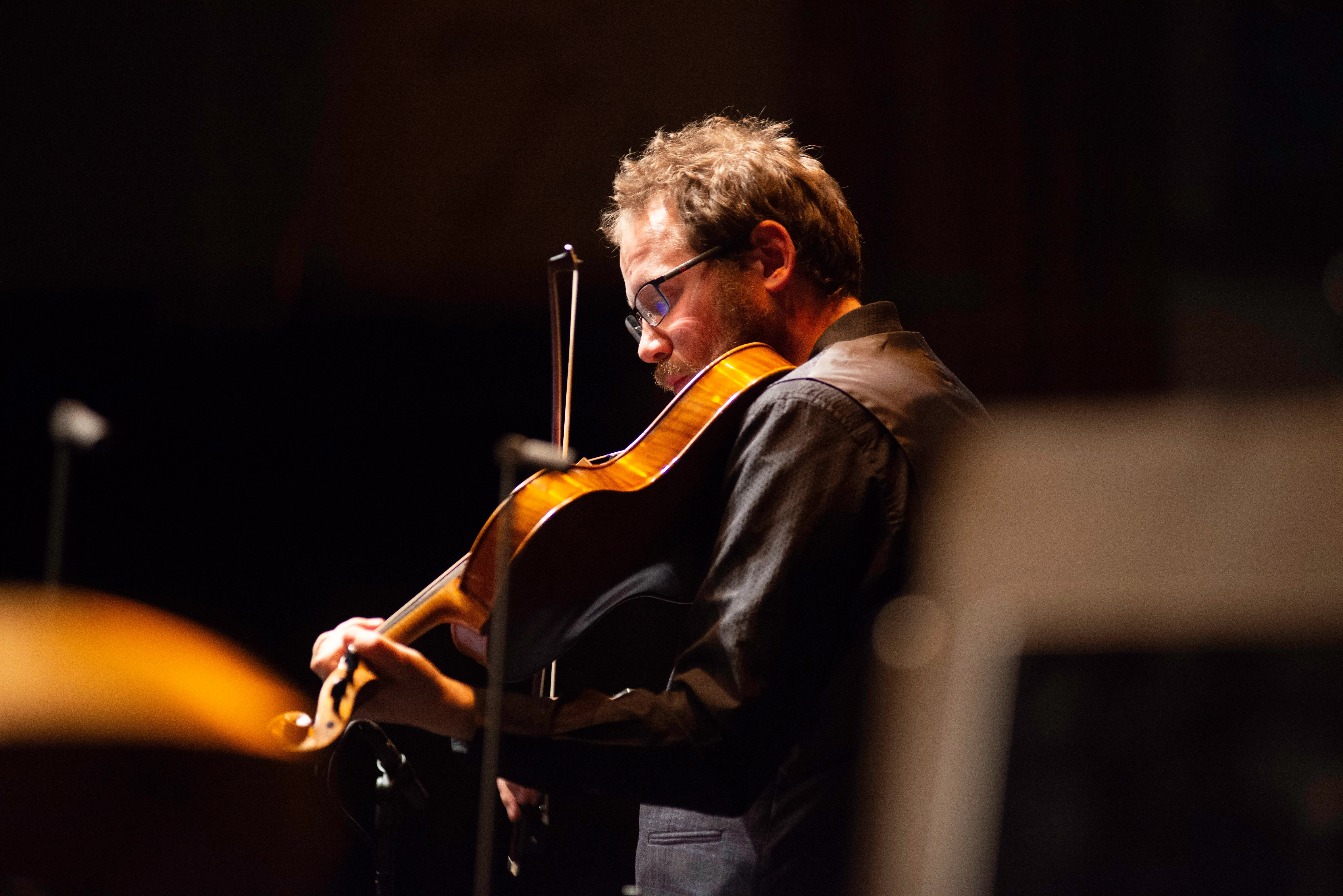 Emlyn Stam performing on stage